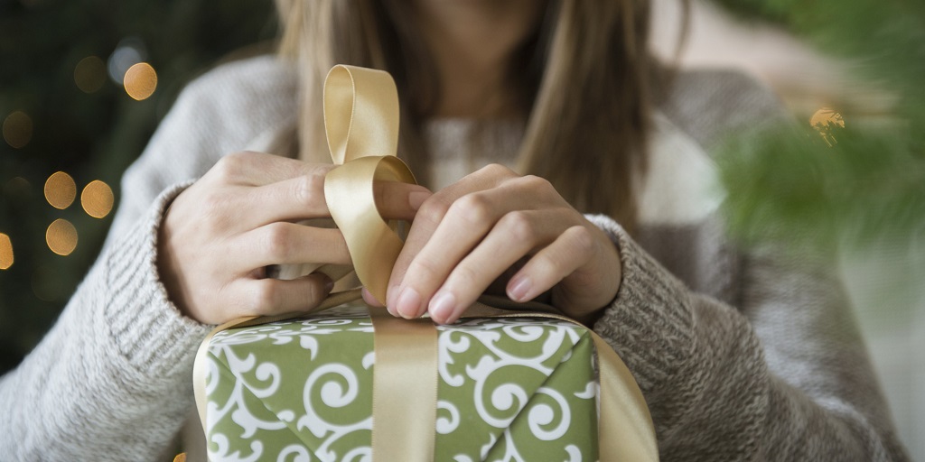 Woman preparing christmas gifts
