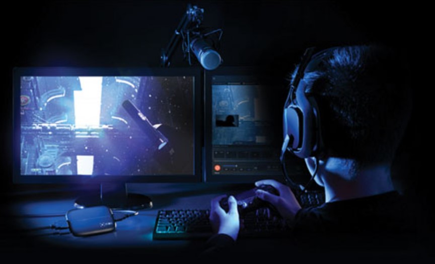 image of guy gaming on PC with Capture Card from Elgato