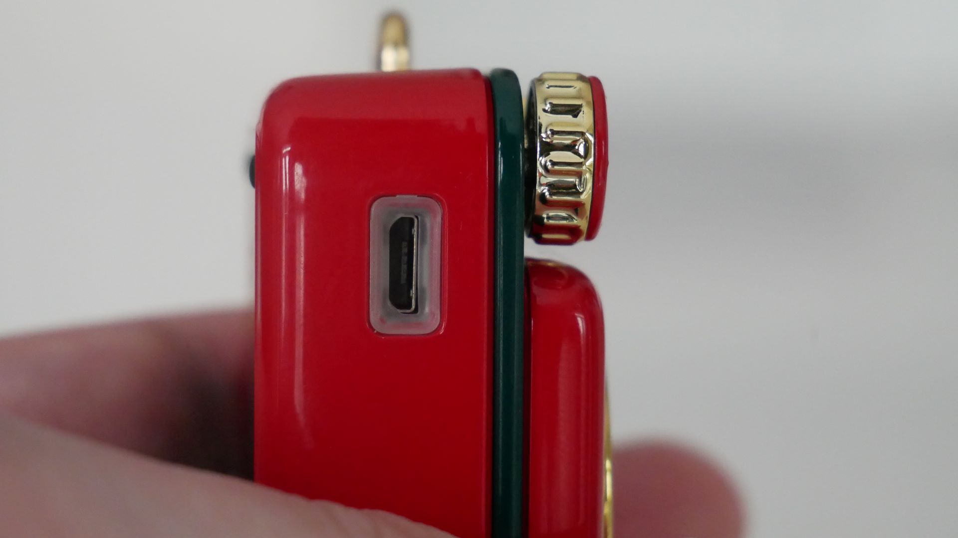 Image of Muzen Button Mini speaker USB-C connection in hand