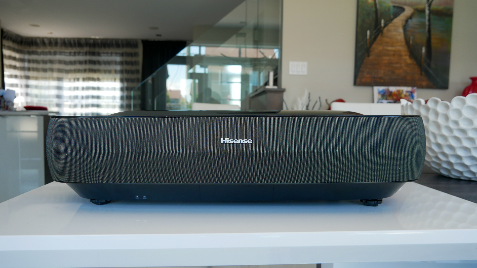 Image of Hisense 100L9G projector on table