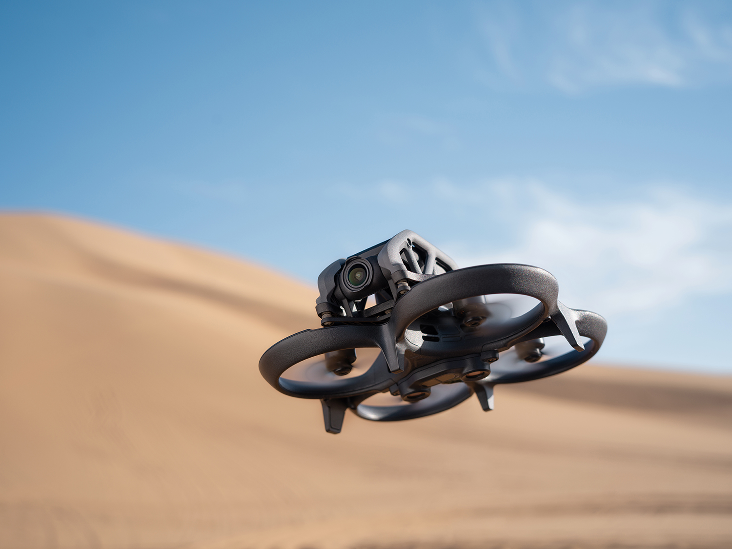 Image of Avata FPV Drone from DJI in air with sable background