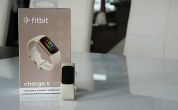 Image of Fitbit Charger 5 on table with box