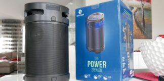 The Power bluetooth speaker by Raycon with box on table