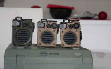 Image of Muzen Wild Mini speaker on boxes