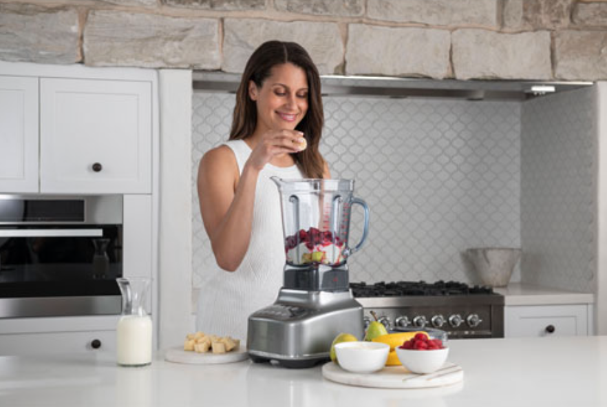 woman-with-breville-blender