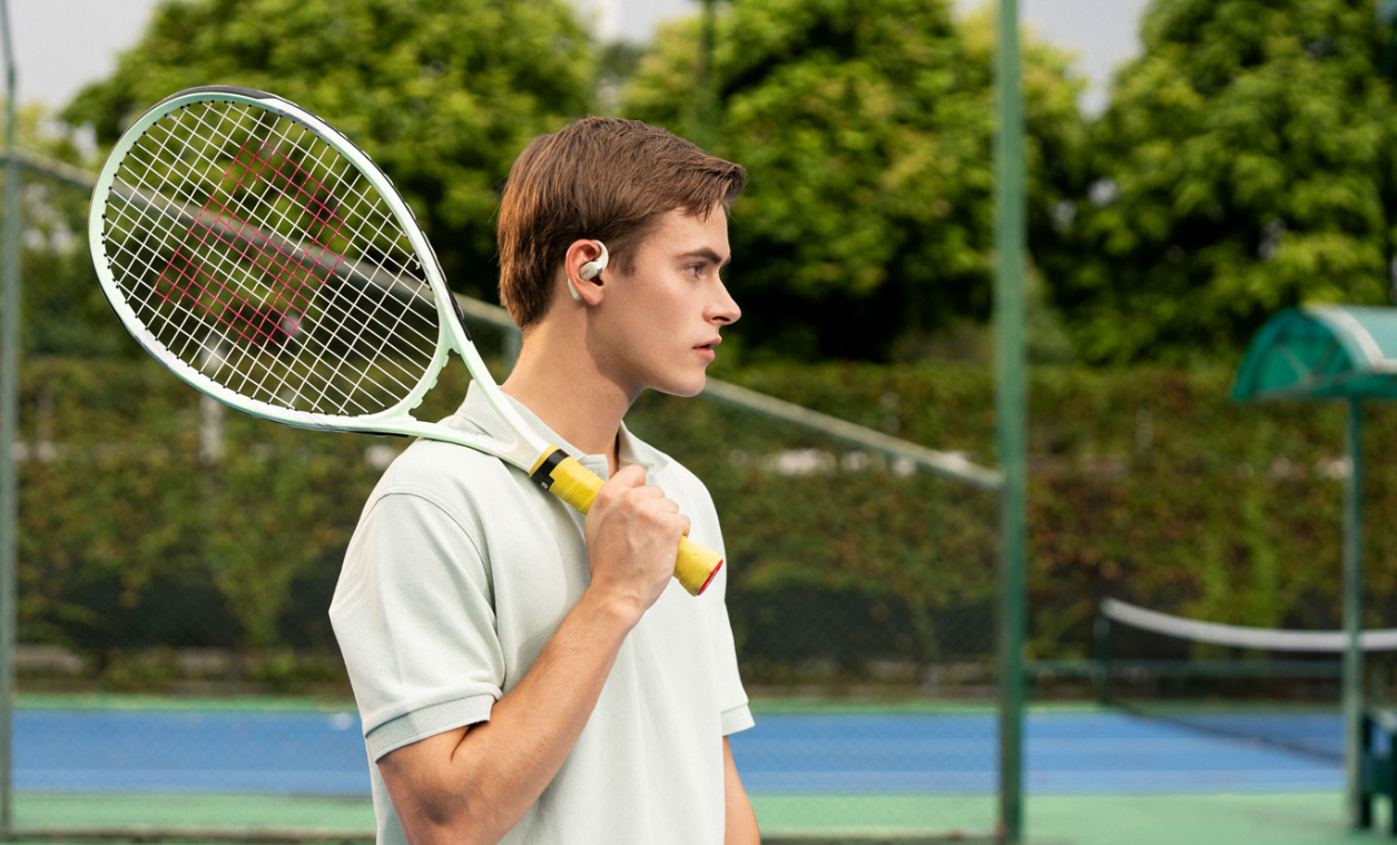 Shock écouteurs ouverts durant un match de tennis