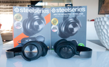 Image of Steelseries Artics Nova Pro headset on table with boxes