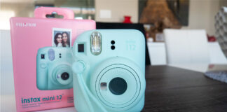 Image of Instax Mini 12 by Fujifilm with box on table