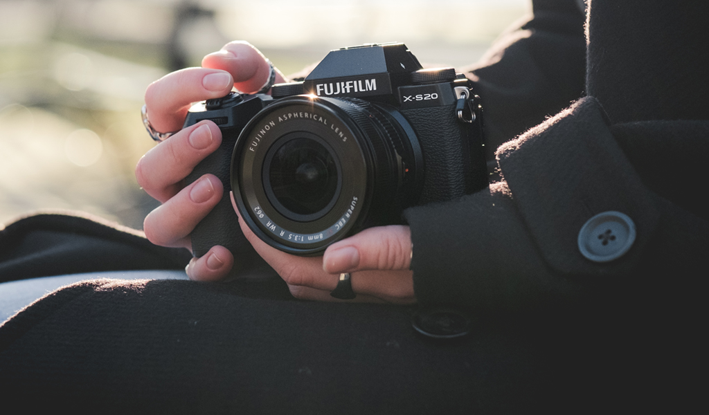 Image of Fujifilm XS-20 in hand outside