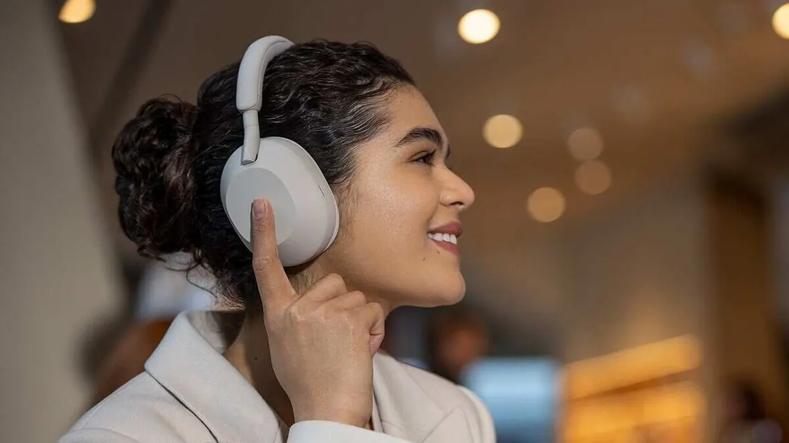 Image of Woman using Sony Headphones