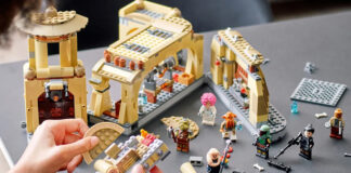 Person building a Star Wars-themed LEGO set