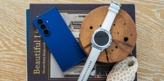 Samsung Galaxy Z Fold7 next to Galaxy Watch8 Classic on top of books.