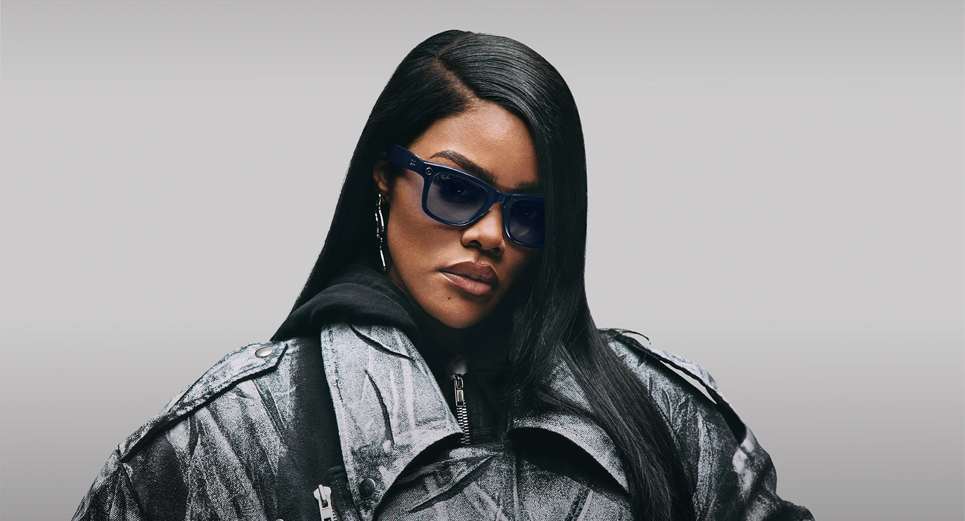 Stylish woman wearing Ray-Ban Meta Gen 2 smart glasses.